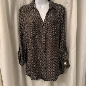 IZ Byer button up shirt.